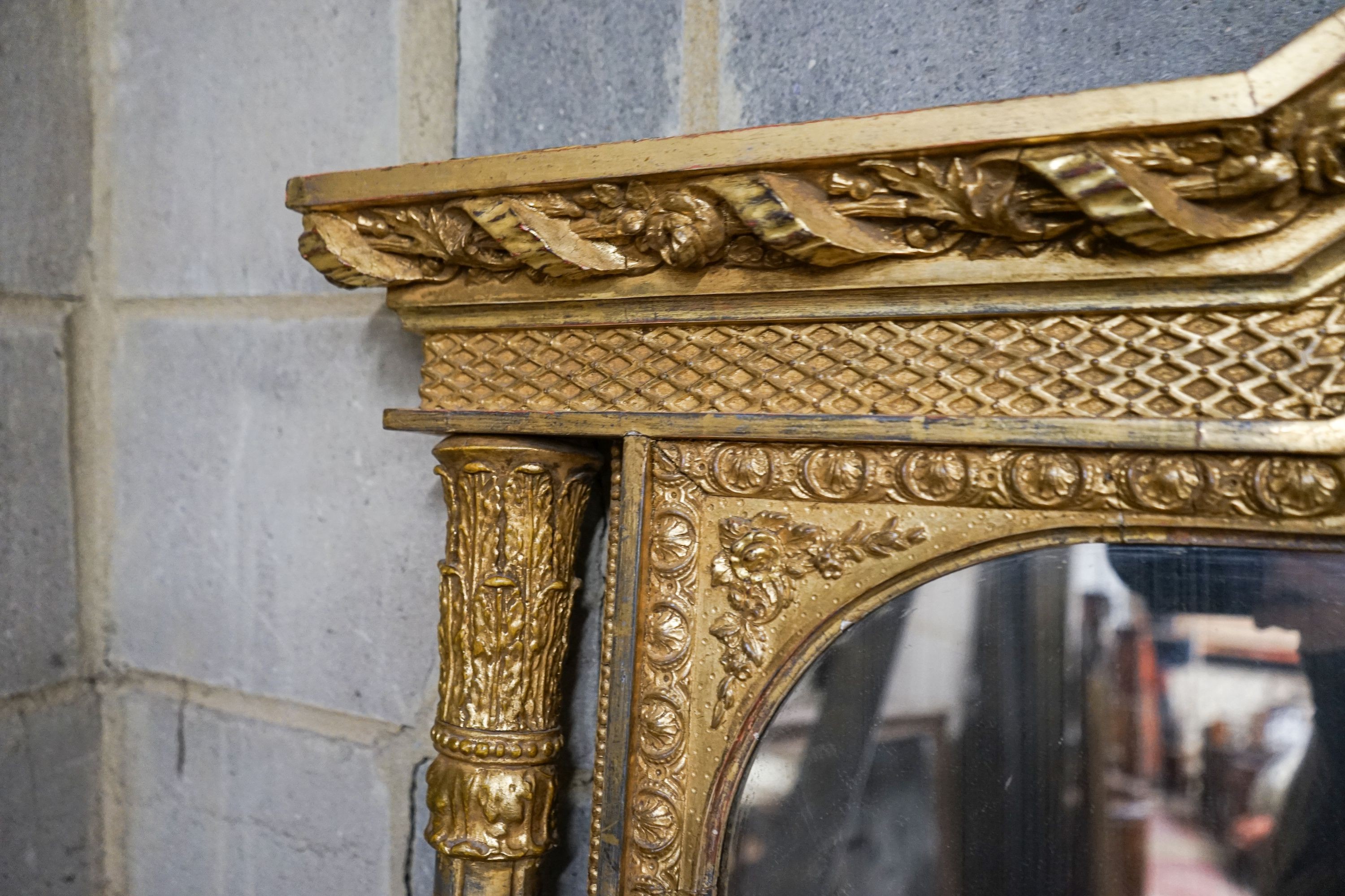 A Victorian carved giltwood and gesso overmantel mirror, the plate flanked by fluted columns, width 155cm, height 178cm